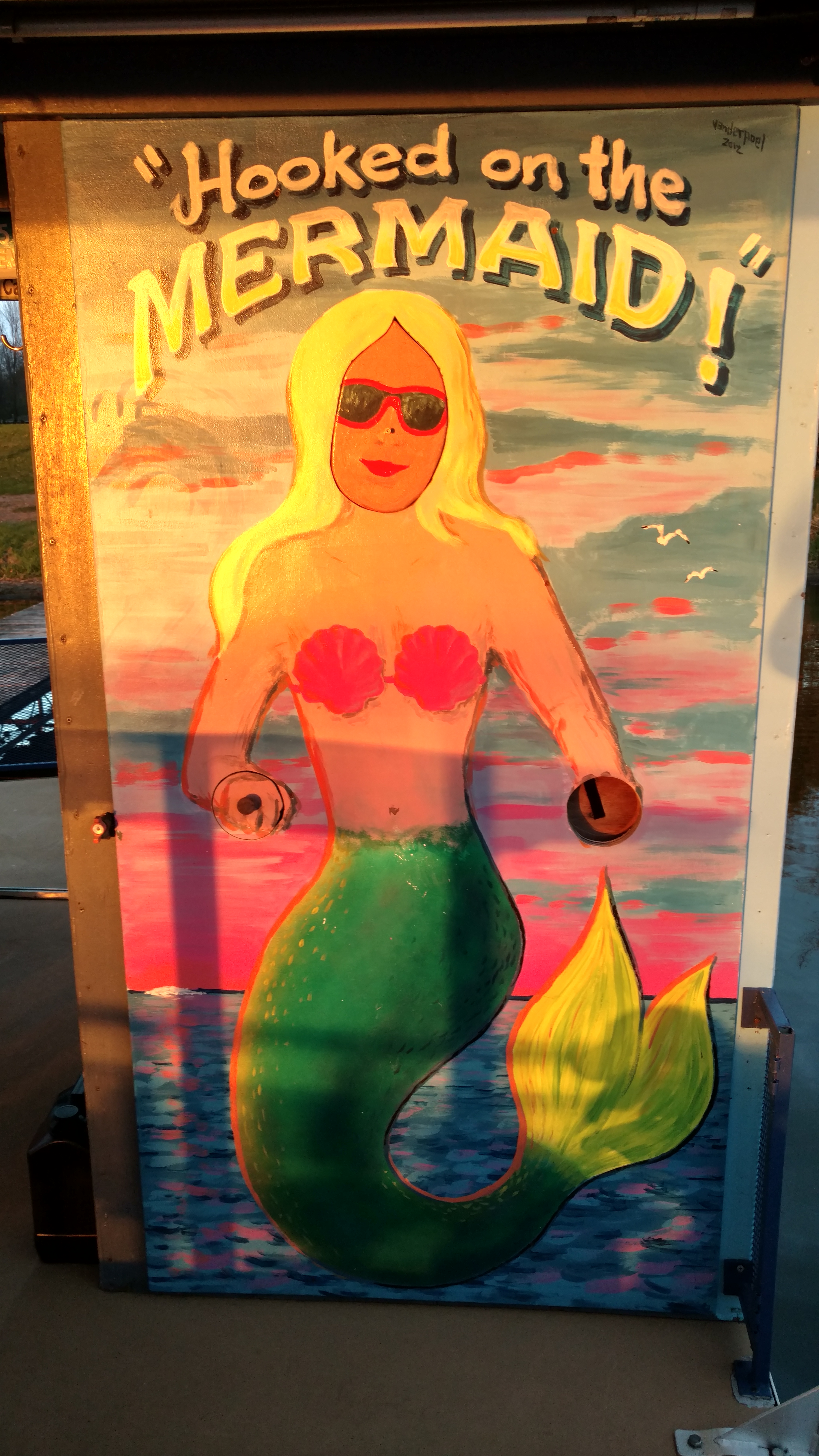 Picture of a mermaid with sunglasses on